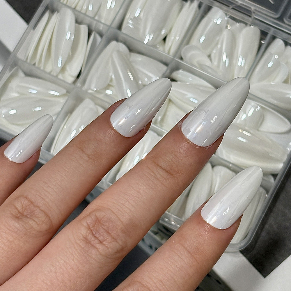 Women's multi-shape press-on false nail kit for easy DIY manicures. Instant artificial nails.