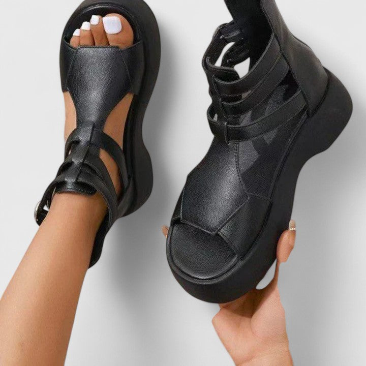 Women's multi-strap platform sandals with a chunky sole, perfect for summer fashion and urban style.