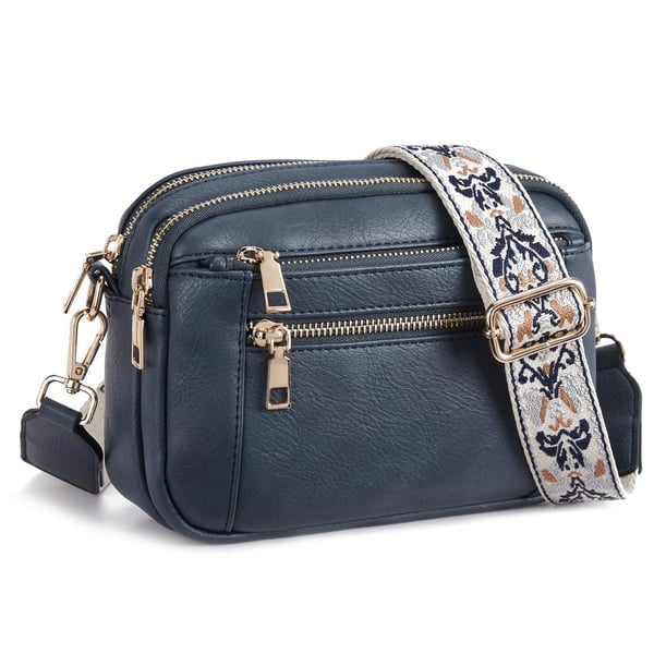 Stylish & practical women's multi-zip crossbody bag. Features secure compartments & an eye-catching printed strap.
