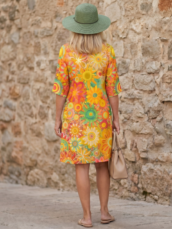 Multicolor floral summer dress, knee-length, short sleeve, relaxed fit, ideal for women.