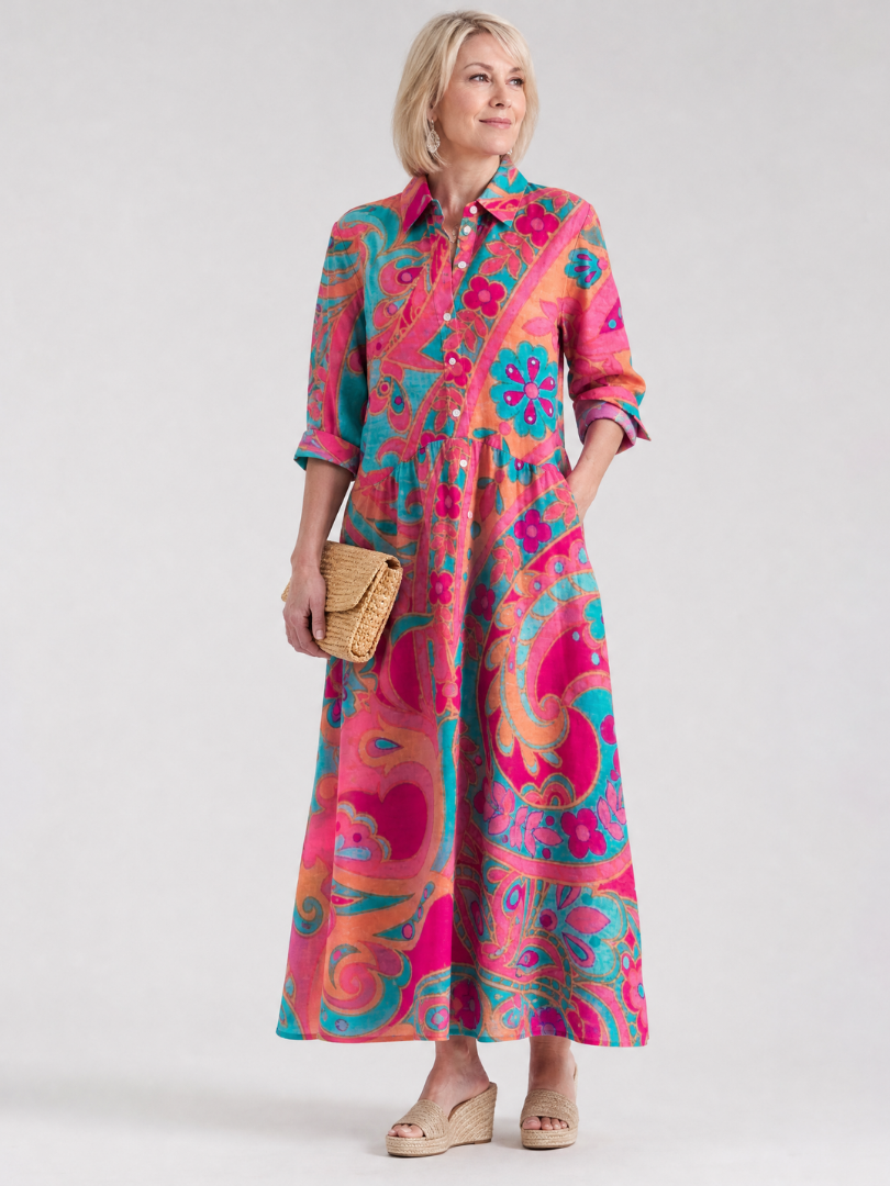 Women's multicolor printed midi dress with collared neckline & button front. Perfect for casual summer style.