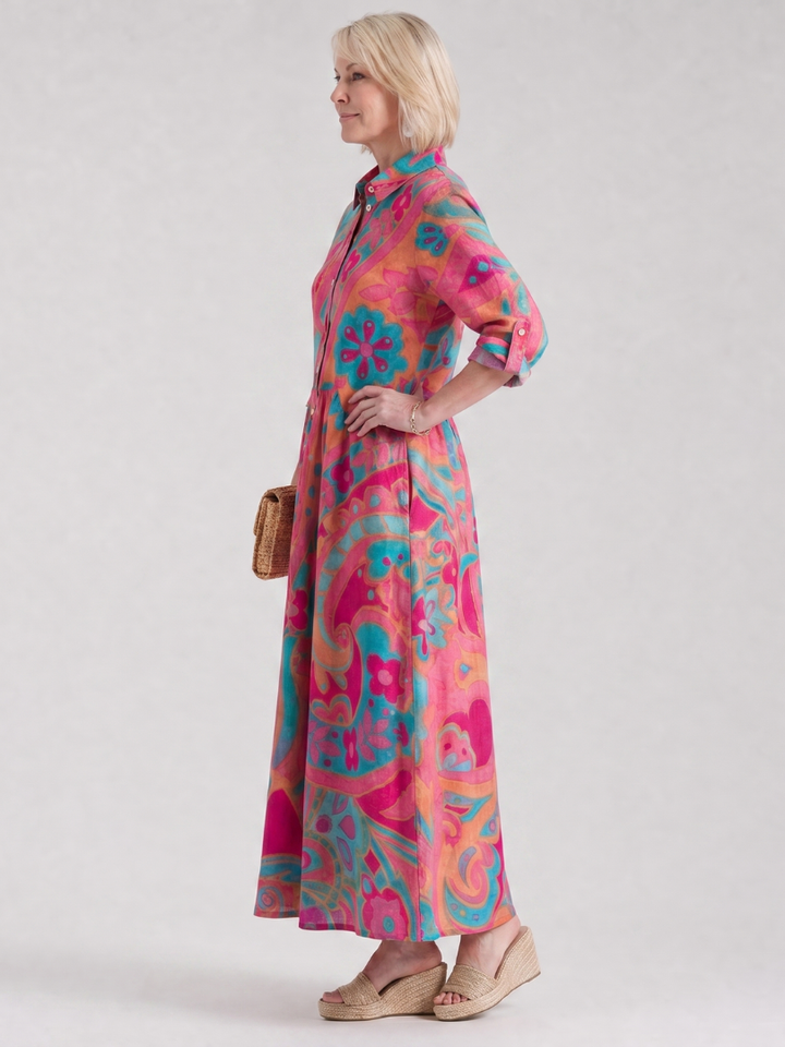 Relaxed fit women's printed button-front midi dress, ideal for daytime wear, travel, and versatile summer fashion.