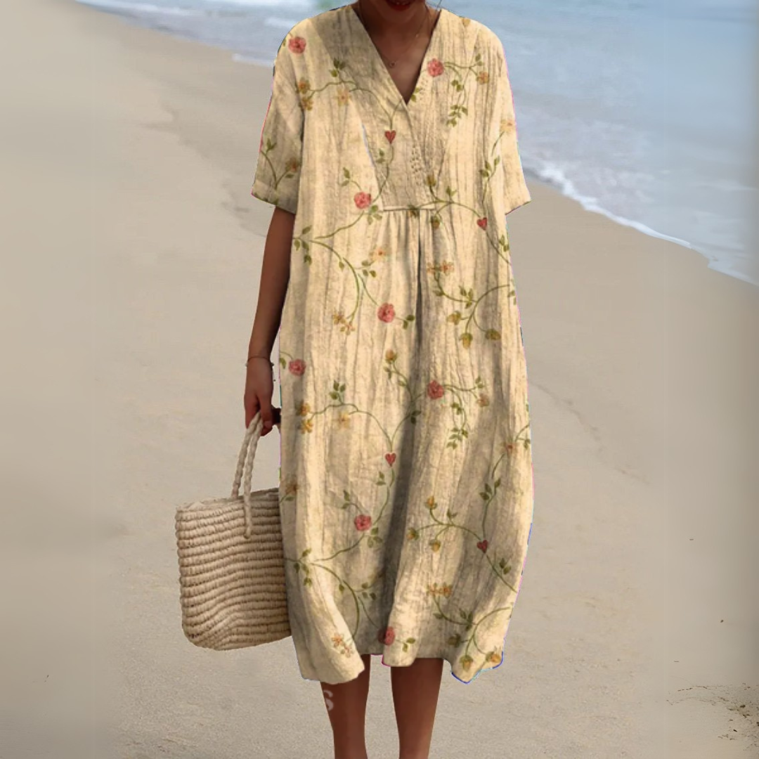 Women's multicolour V-neck floral midi dress, chic summer casual vacation style.