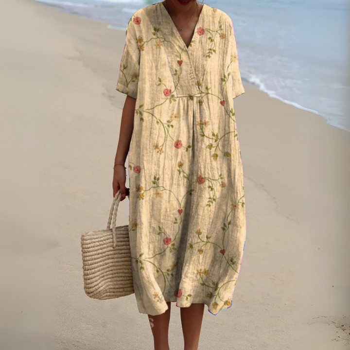 Women's multicolour V-neck floral midi dress, chic summer casual vacation style.