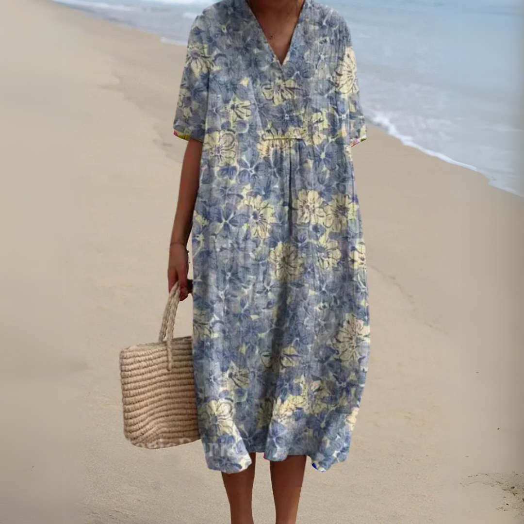 Enjoy summer in this elegant multicolour V-neck midi dress for women. Perfect floral style.