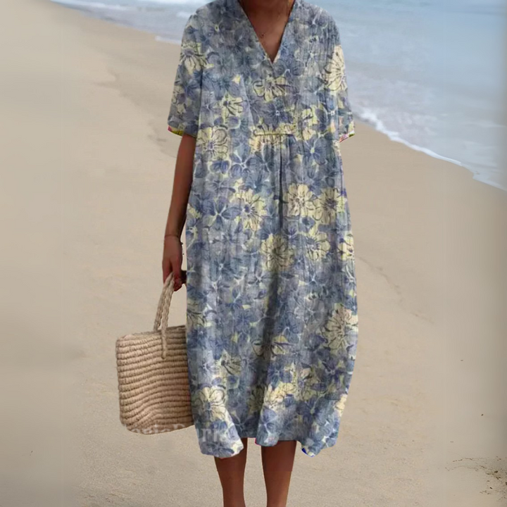 Enjoy summer in this elegant multicolour V-neck midi dress for women. Perfect floral style.