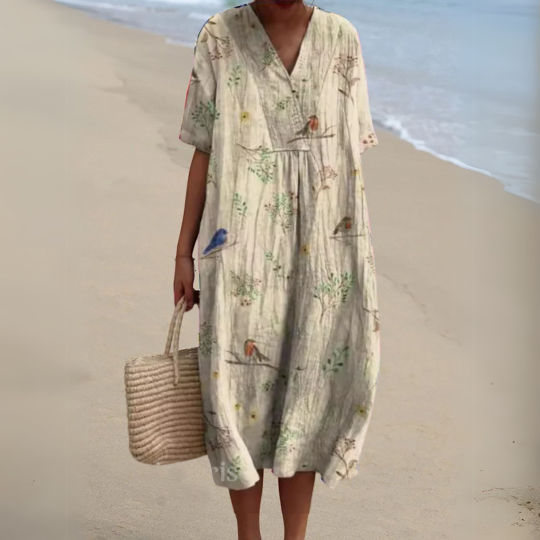 Women's multicolour V-neck midi dress, elegant floral pattern for summer fashion.