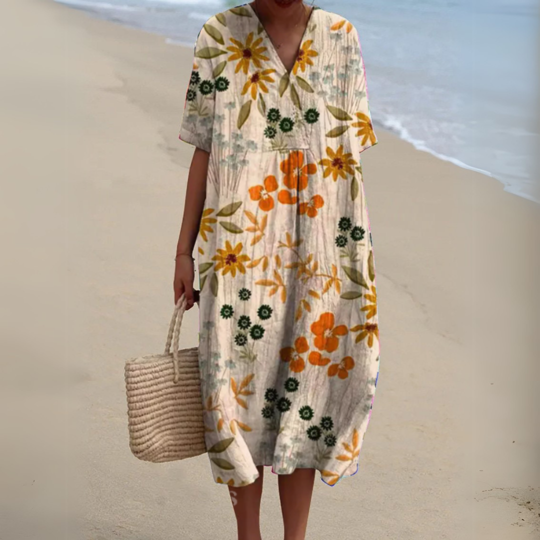 Effortless summer style in this women's multicolour V-neck flowy midi dress.