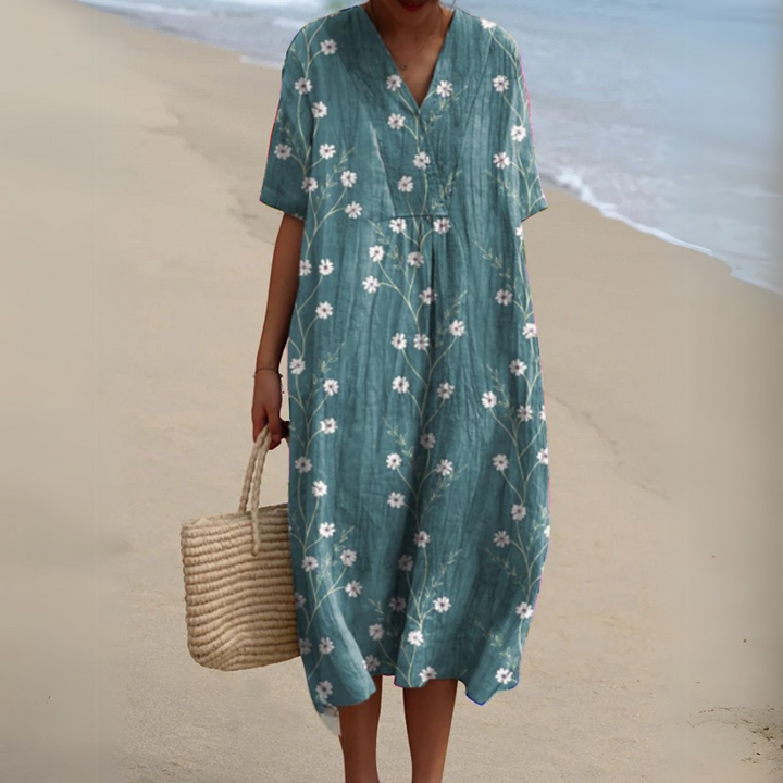 Flowy floral V-neck midi dress for women, ideal for summer vacations & elegant casual outings.