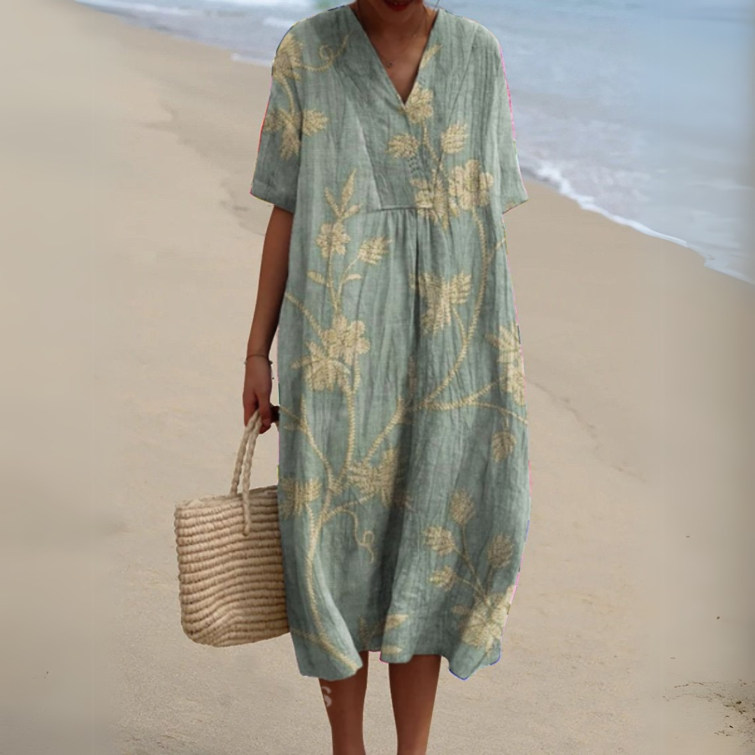 Elegant summer midi dress for women, vibrant multicolour floral print & V-neck design.