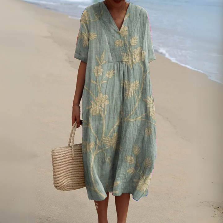 Elegant summer midi dress for women, vibrant multicolour floral print & V-neck design.