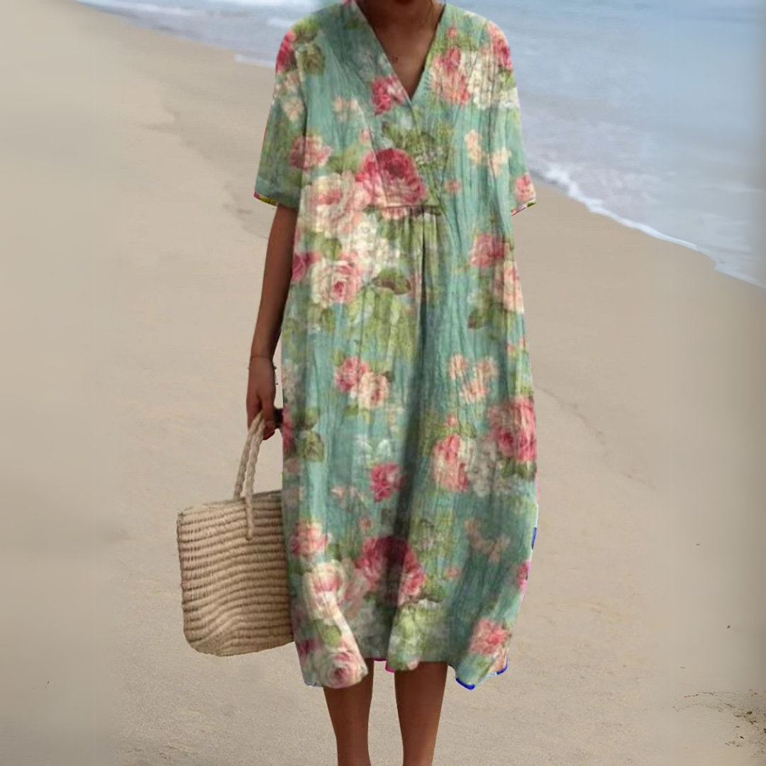 Women's V-neck midi dress, multicolour floral pattern, ideal for summer elegance and ladies' fashion.