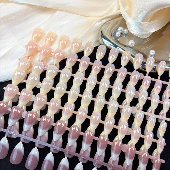 Instant natural glossy press-on nail set for women. Perfect fake nails for effortless beauty and a polished look.