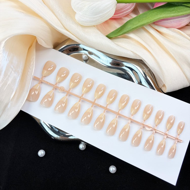 Versatile natural glossy press-on nails for women. Instant fake nails offering everyday elegance & a perfect finish.