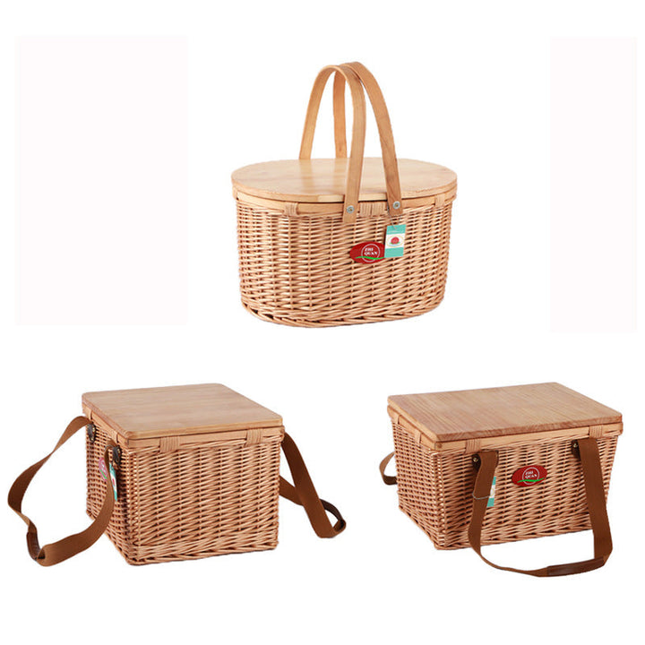 Women's natural woven picnic basket with sturdy wooden lid, ideal for elegant outdoor picnics & park outings.