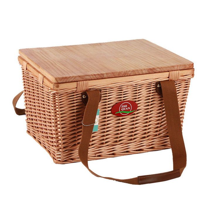 Hand-crafted oval picnic basket with sturdy wooden lid for women, natural brown & white, ideal for elegant outdoor use.
