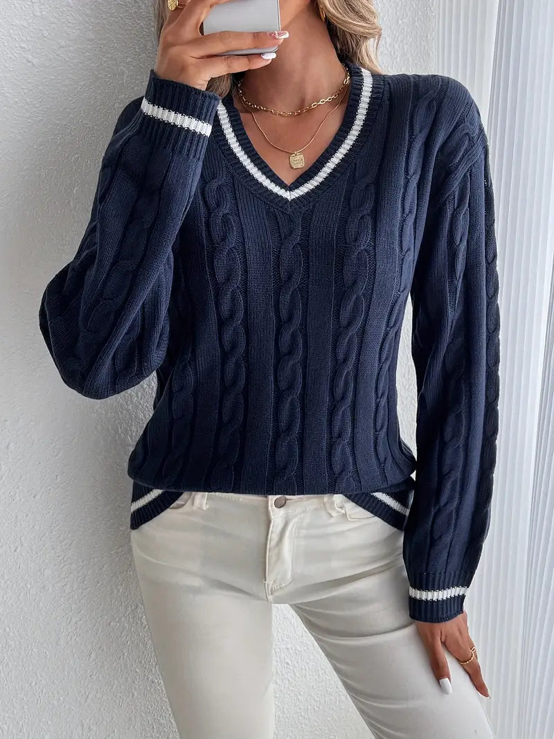 Women's navy blue V-neck cable knit sweater with striped trim, long sleeve, perfect for fall and winter fashion.