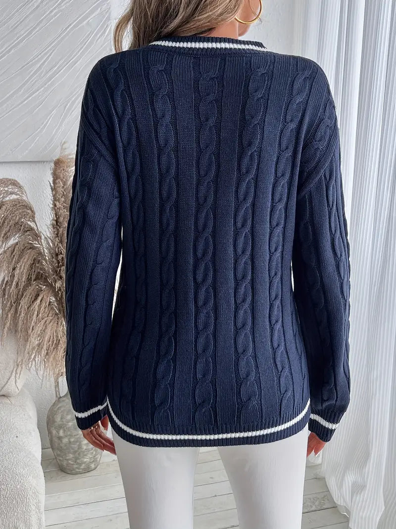 Preppy women's navy blue V-neck cable knit sweater with distinctive striped trim, a versatile long sleeve winter top.