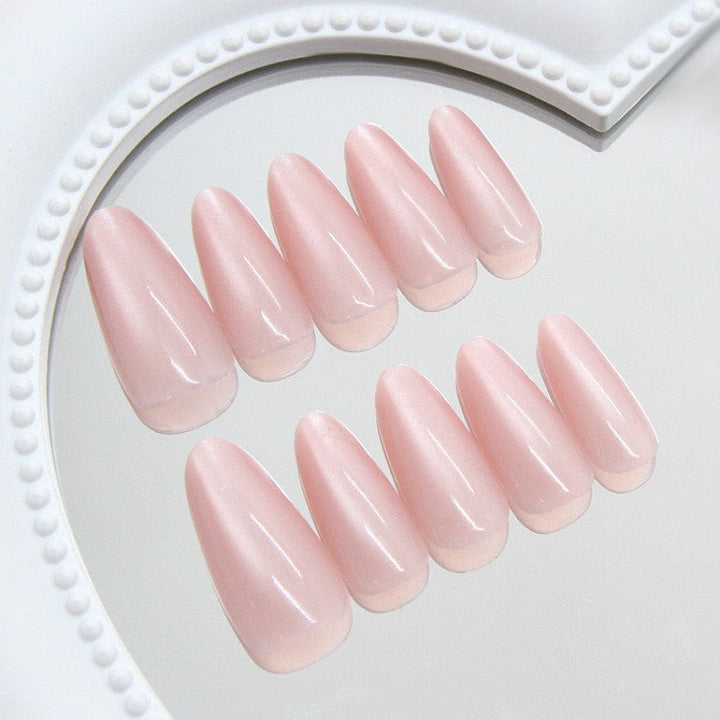 Women's nude pink cat eye gel nail polish kit for salon-quality manicure, long-lasting nail art.