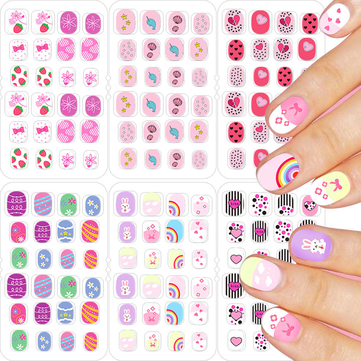 Summer beach press-on nails featuring delicate starfish and seashell nail art, perfect for a quick ocean manicure.