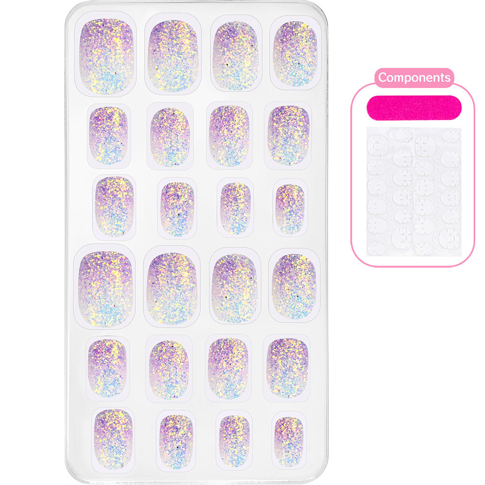 Quick manicure false nails, ocean themed with intricate starfish and seashell designs for summer style.