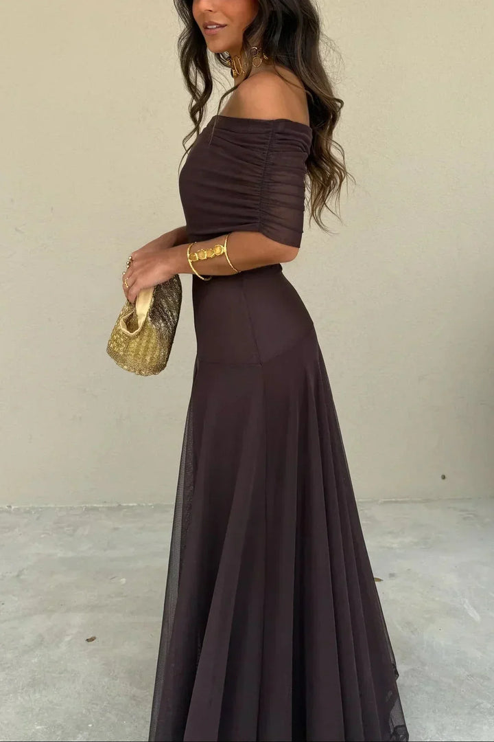 Elegant women's off-shoulder formal dress with draped waist detailing, perfect for evening events.