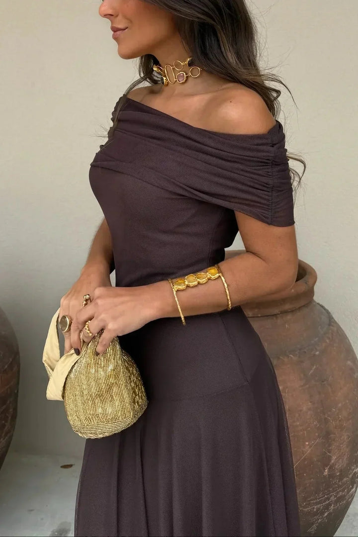 Stunning women's off-shoulder wedding guest maxi dress, a chic and sophisticated formal gown.