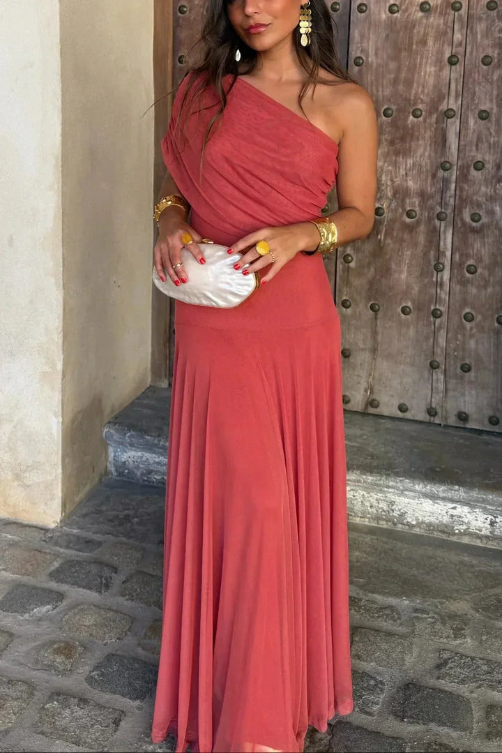 Fashionable women's off-shoulder flowy dress with draped waist, perfect for weddings & special events.