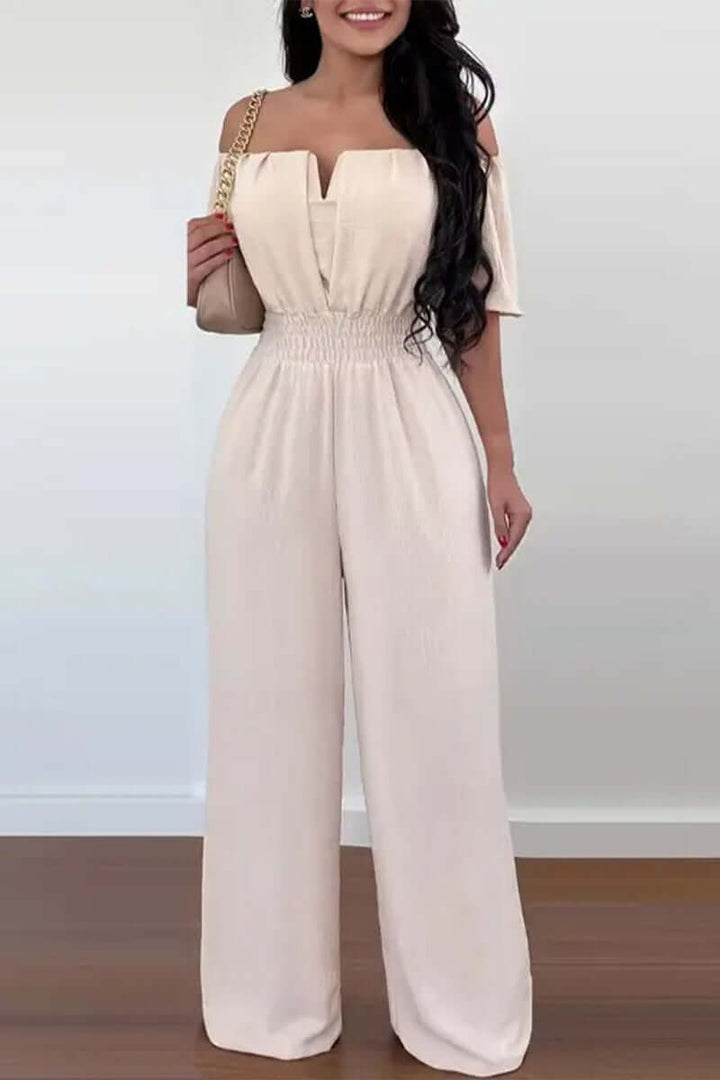 Women's off-shoulder short sleeve jumpsuit in black, elegant and comfortable for versatile casual or evening wear.