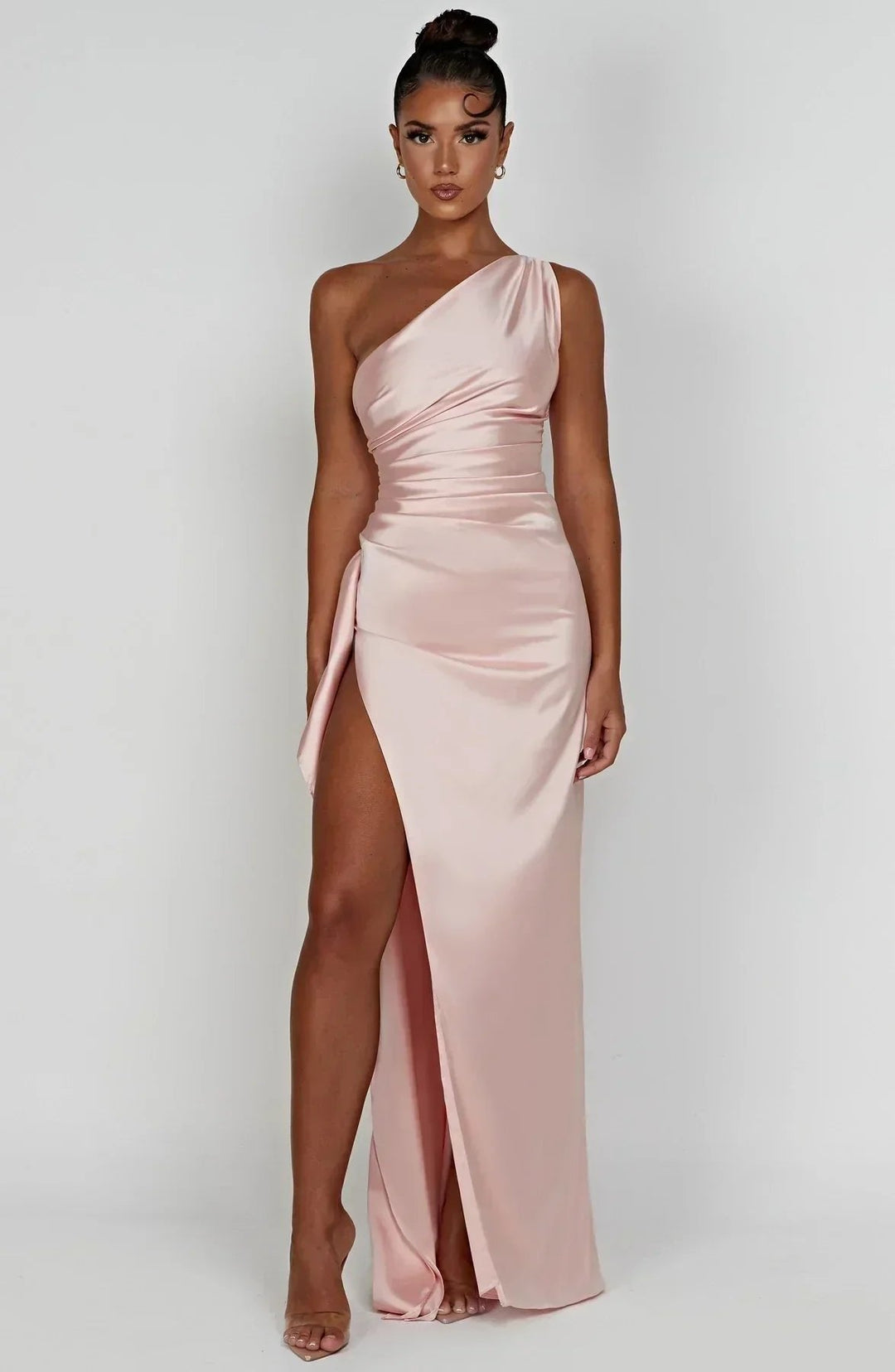 Women's one-shoulder maxi evening dress with high split. Asymmetric elegant formal wear for special events.