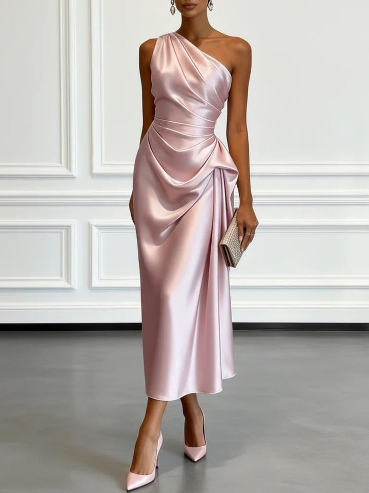 Beautiful women's wedding guest dress: a one-shoulder midi with flattering ruching and elegant style.