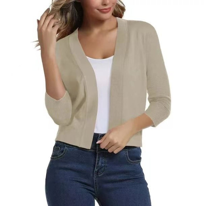 Women's office-appropriate cropped cardigan, 3/4 sleeve, open front design for professional look.