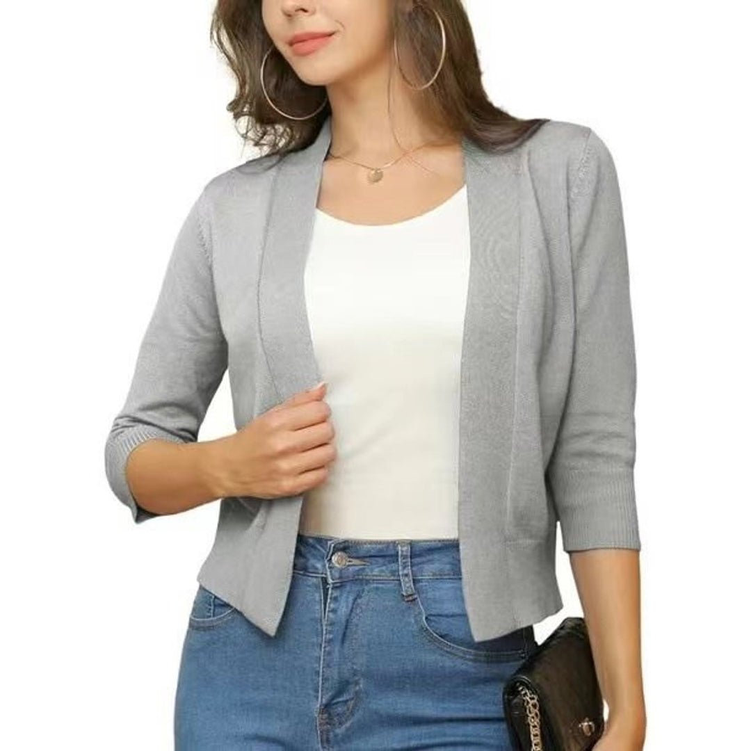 Elegant women's open-front cropped cardigan, ideal for chic casual wear and layering.