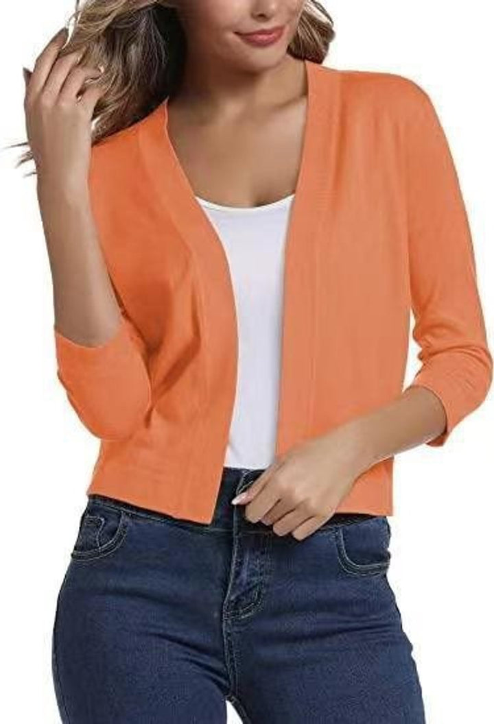 Modern women's cropped cardigan with 3/4 sleeves and open-front style, a versatile fashion piece.