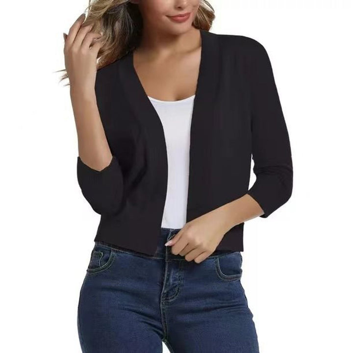 Elegant open-front cardigan for women, ideal for office wear or casual outfits.