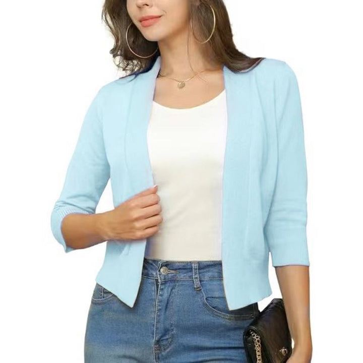 Stylish women's open-front 3/4 sleeve cropped cardigan for elegant layering top.