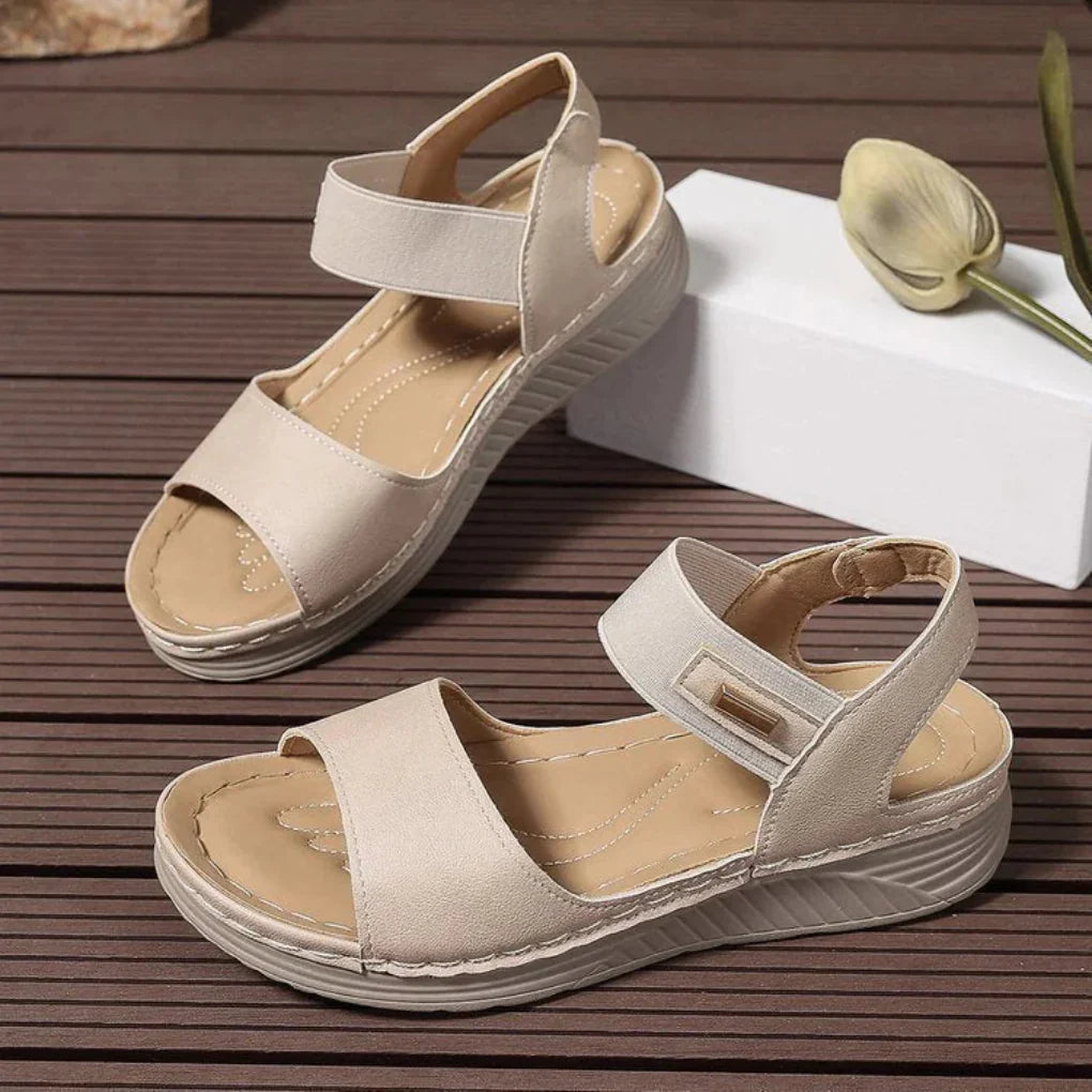 Versatile women's open toe cushioned sandals. Easy slip-on flats for spring, summer, and casual elegance.