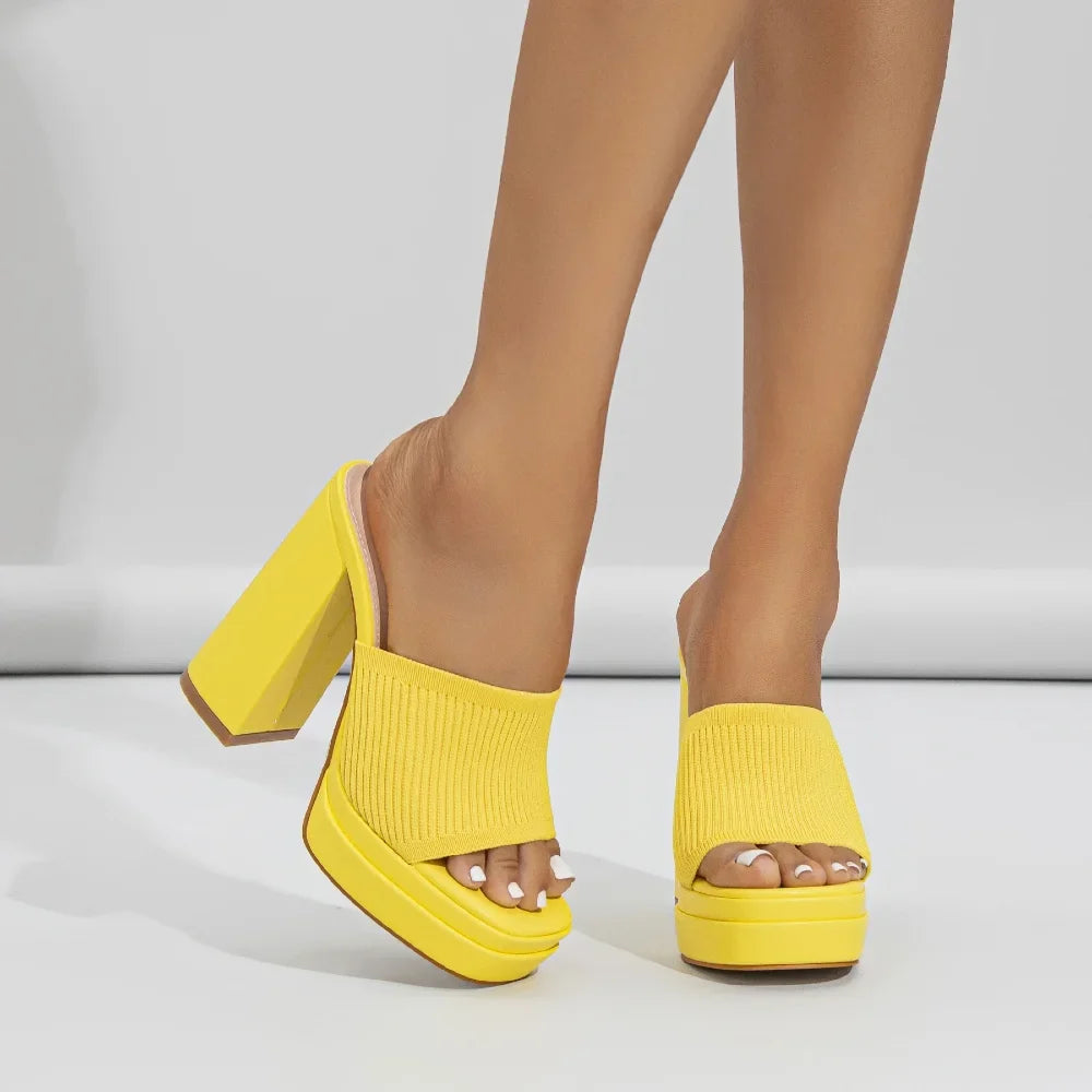 Women's platform sandals: open-toe, chunky heel, comfortable, stylish summer footwear.