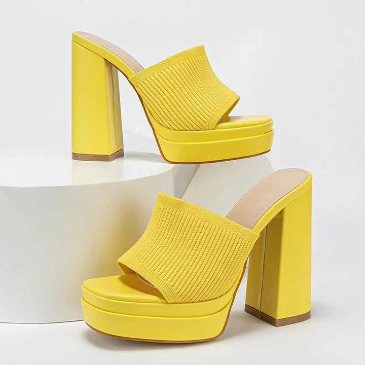 Women's platform sandals with adjustable strap, open-toe, and stable chunky heel.