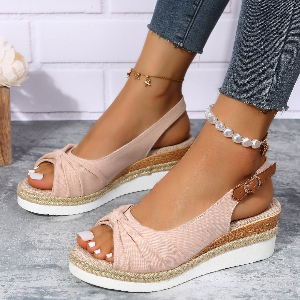 Summer-ready women's open-toe wedge sandals, fashionable and comfortable with ankle strap.