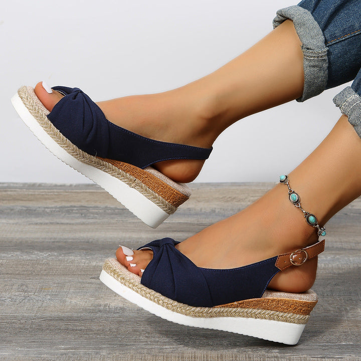 Versatile women's open-toe wedge sandals, comfortable summer shoes with an elegant ankle strap.