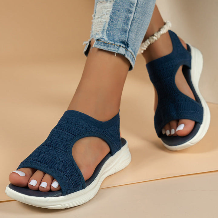 Lightweight women's ortho sandals, ideal for summer, offering cushioned support & easy slip-on convenience.