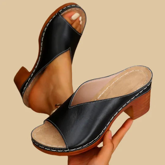 Stylish black women's orthopaedic chunky heel sandals, offering excellent arch support for all-day wear.