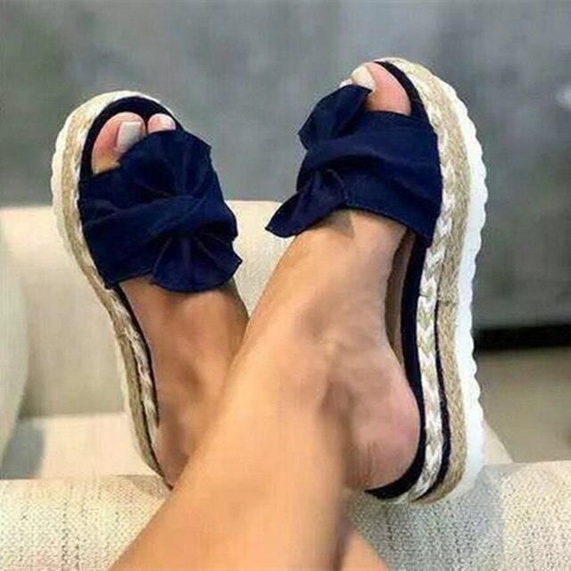 Supportive women's slip-on sandals, orthopaedic design for comfortable everyday walking.