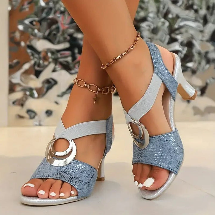 Comfortable orthopaedic women's sandals with arch support, cross-strap design & stable block heel.