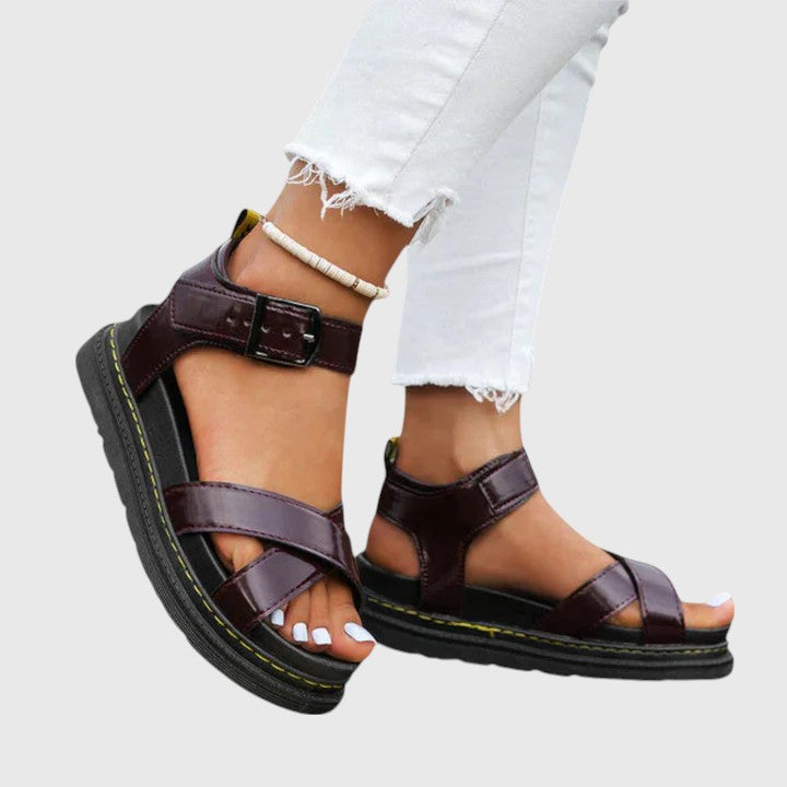 Women's orthopaedic sandals with arch support, adjustable straps & comfortable footbed for all-day relief & walking.