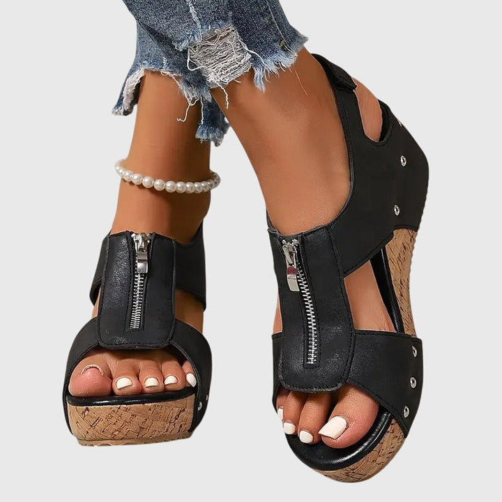 Supportive women's orthopaedic sandals with advanced arch support. Essential comfort footwear for pain relief.