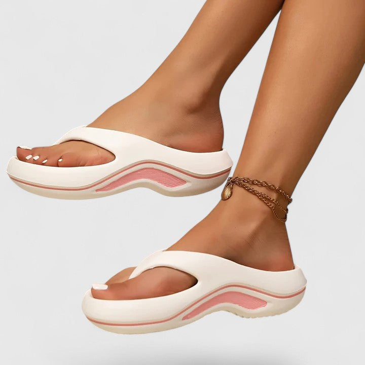 Stylish women's slip-on slide sandals, perfect for summer casual wear with ergonomic design.