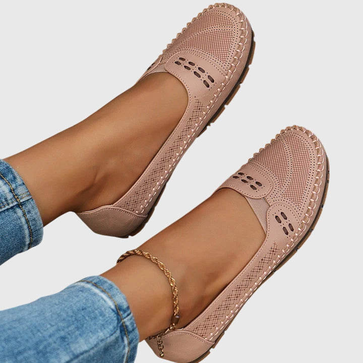 Modern women's loafers, providing essential arch support and a comfortable, breathable fit.