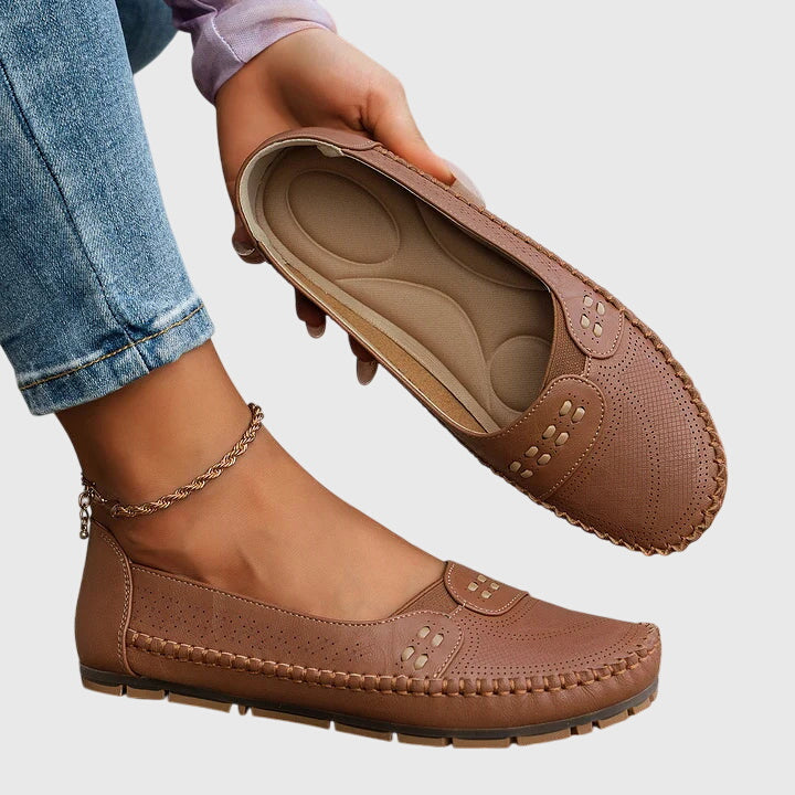 Women's arch support loafers, slip-on style, providing all-day comfort & relief for active feet.